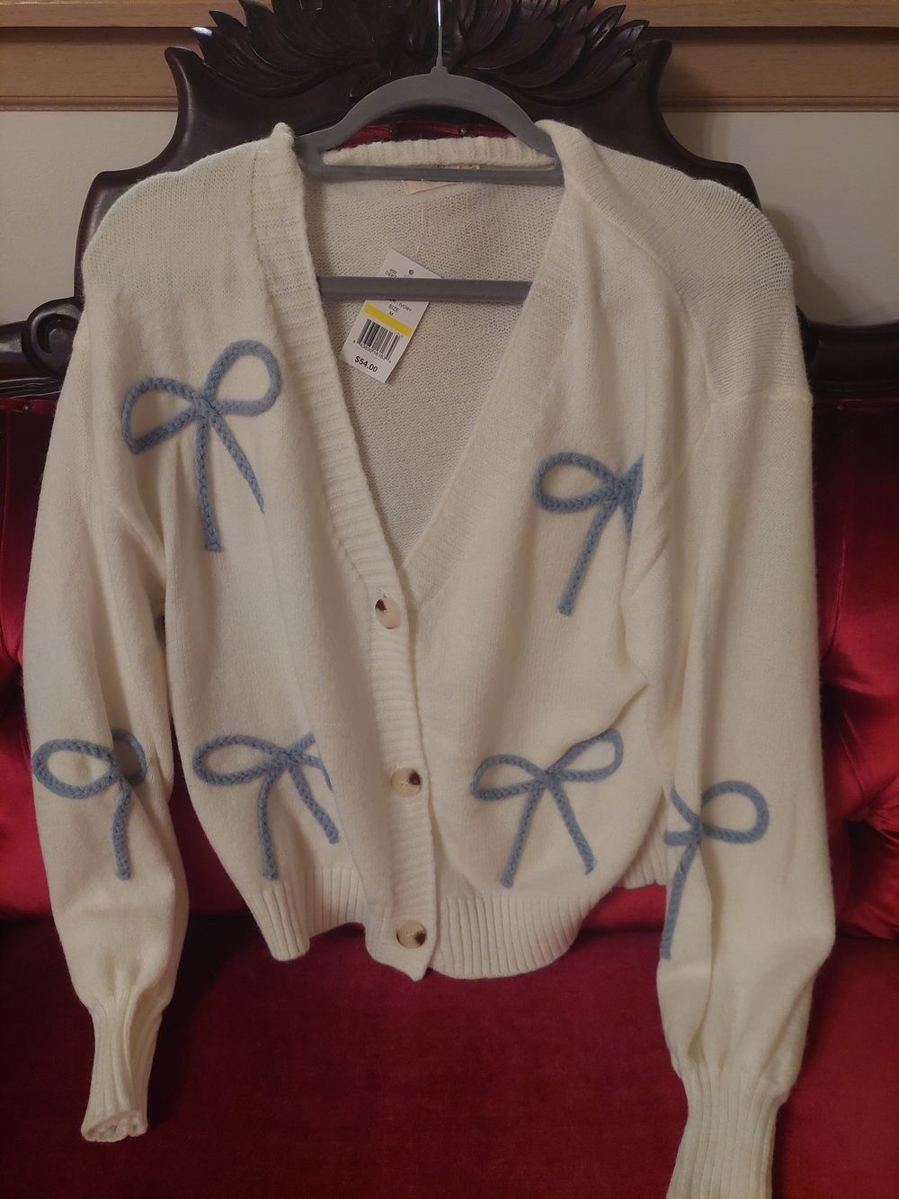 Cream V-Neck Cardigan with Blue Bow Appliqués